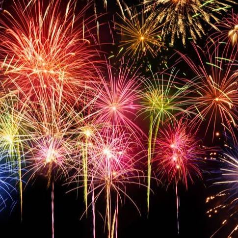 Display of colorful fireworks on a black backdrop