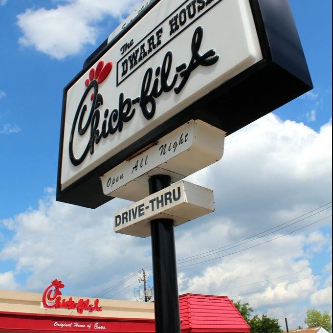 Chick Fil A sign with the sky backdrop before current remodel
